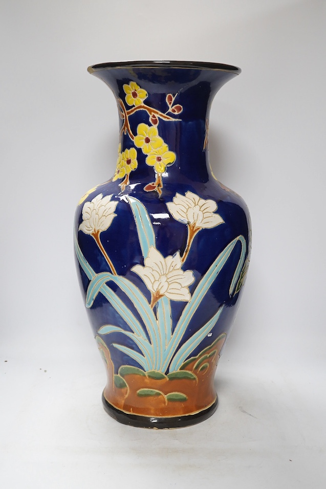 A South East Asian polychrome pottery vase and a Staffordshire pottery greyhound pen holder, vase 53cm high. Condition - vase fair, pen holder marks to glazing